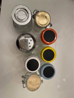 Assorted glass kitchen seasoning jars