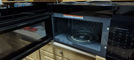 Home Depot Vissani 1.7 cu ft over the range microwave  in black