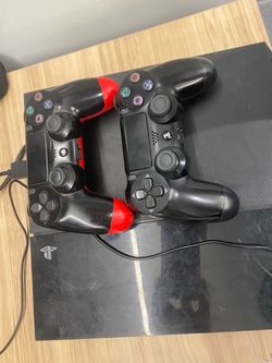 PlayStation 4 Console with Two Controllers