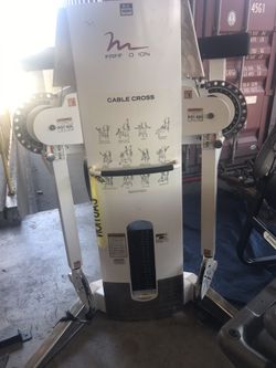 Free motion dual cable cross over machine with dual stack weights