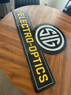 SIG optics collectible metal sign.