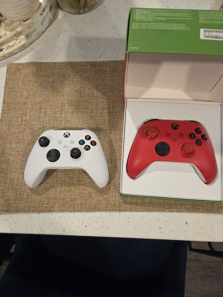 Two Xbox Controllers