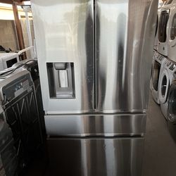 Samsung stainless steal 4 door refrigerator