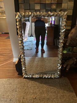 Mirror With Textured Silver Lining- Measurements are 42 In Talk And 27 In Wide