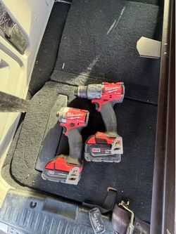 Milwaukee brushless drill and impact driver with batteries