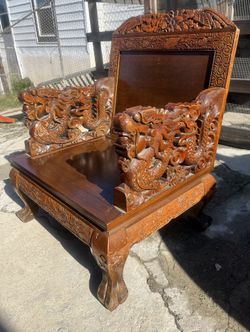 Antique Southeast Asian Carved Teak Wood Sofa Bench and Matching Chair with Elaborate Dragon Carvings and Floral Designs