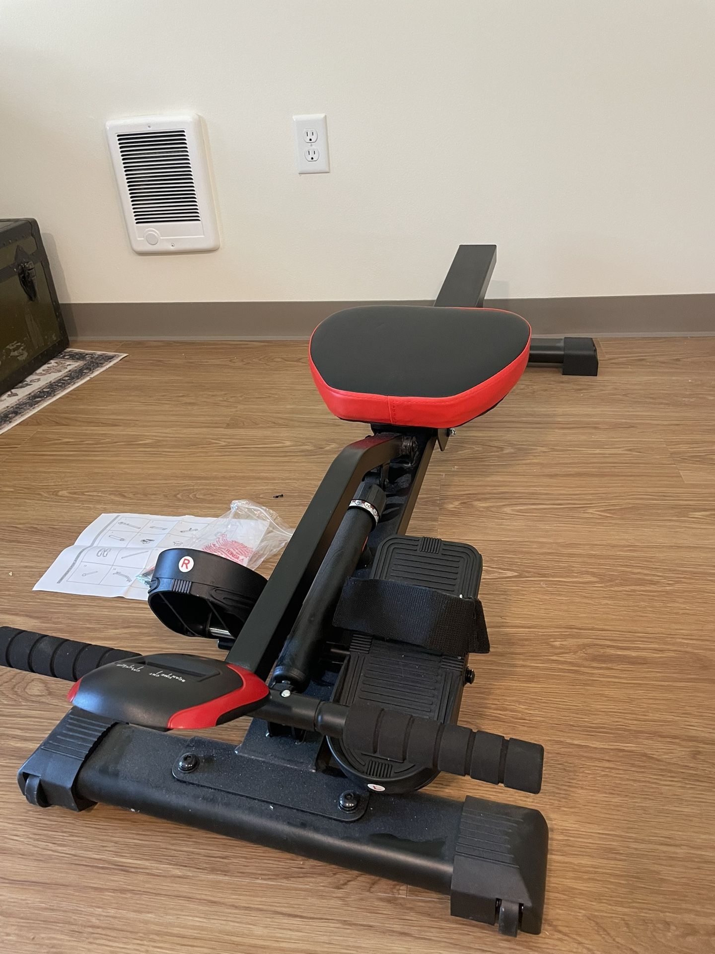 Space Saving, Adjustable Rowing Machine. Minimum Use.