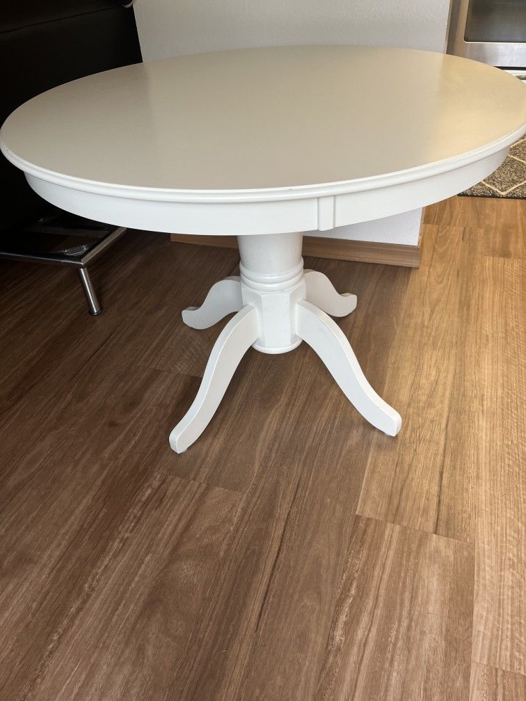 White Round Wooden Table