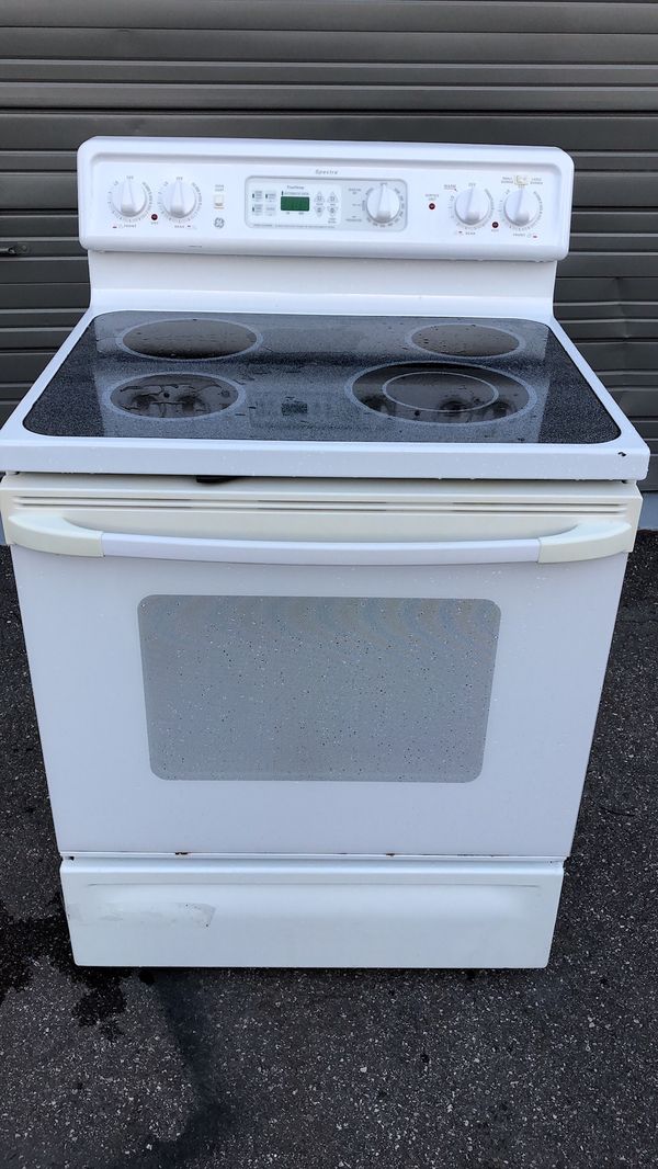 Ge white glass top stove for Sale in Orlando, FL OfferUp