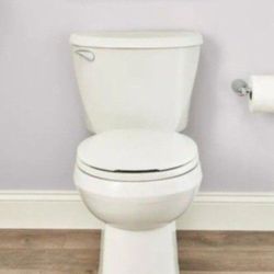 American Standard Reliant Two-Piece 1.28 GPF Single Flush Round Standard Height Toilet with Slow-Close Seat in White
