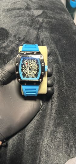 Skeleton Dial Watch with Blue Rubber Strap