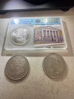 1883 O Brilliant Uncirculated Morgan Dollar & 1(contact info removed) piece dollar
