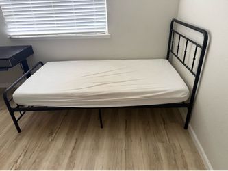 2 twin beds and frames