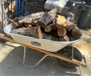 Mixed firewood for sale by the wheelbarrow