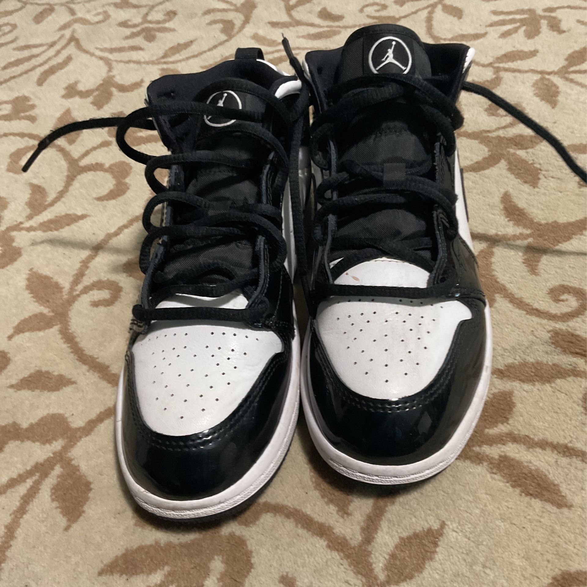 Black and white jordan 1’s