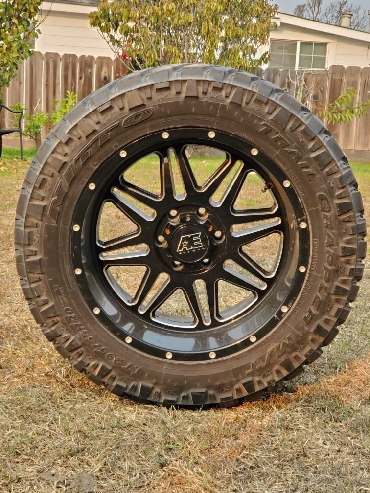 Alloy 20" rims and nitto tires 295/55R20 all terrain