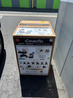 Evenflo Shyft Intuiti+ Travel System with Revolve180 Car Seat & SensorySoothe and Green & Gentle (Champagne)