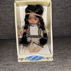 Native american porcelain indian doll