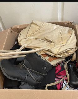 Assorted items: women's clothing (sizes L and XL) and household goods. This box contains approximately 50 to 60 new and gently used items, valued at $
