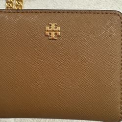 Authentic Tory Burch wallet, if it’s posted it’s available.See map for pick up.Only contact 4 pickup