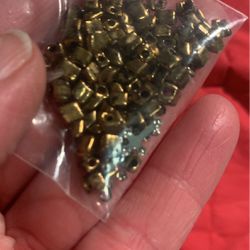 Small Bag Of Golden Beads 