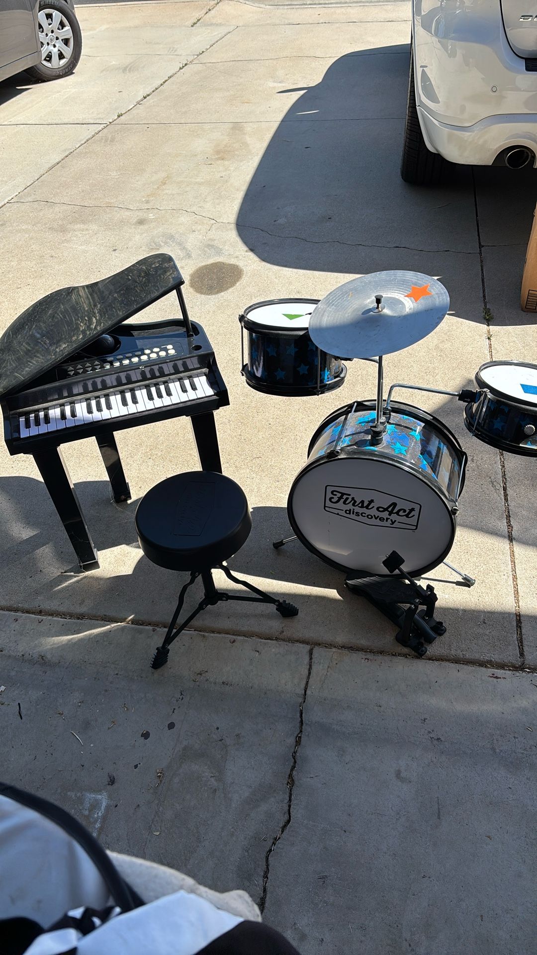 Kids drum sets and piano