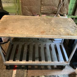 custom-built aluminum rolling cart,  designed for heavy equipment 