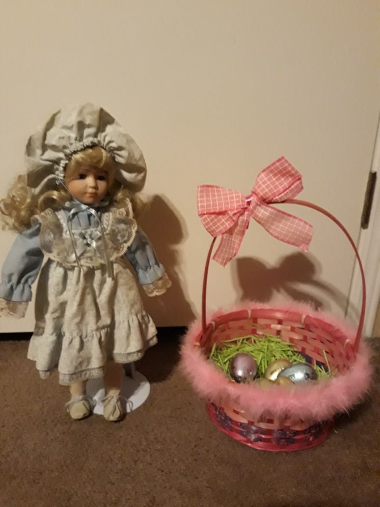 Antique doll with stand and pink Easter basket