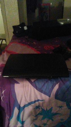 PS3 console (with all cords ) 2 controllers and call of duty ghost