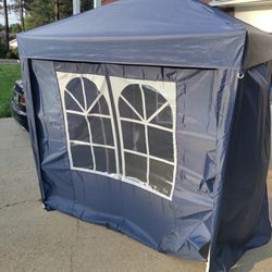 Outsunny 10' x 10' Pop Up Gazebo Canopy Party Tent with Sidewalls and Storage Bag - Blue