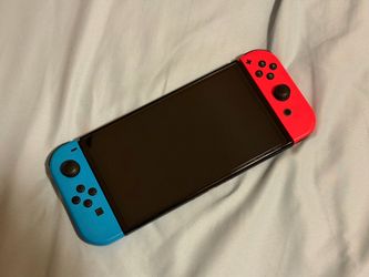 Nintendo Switch OLED with Neon Joy-Cons