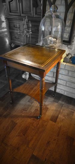 Vtg english 1940s Side Table leather top Regency Style wheel legs