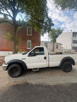 2004 f-350 superduty and dump trailer 2025 with aromatic crank