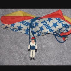 1975 Fisher Price Adventure People Parachute Skydiver. Throw it on the air and watch it gently glide down. For pickup in Tampa. Cash only.