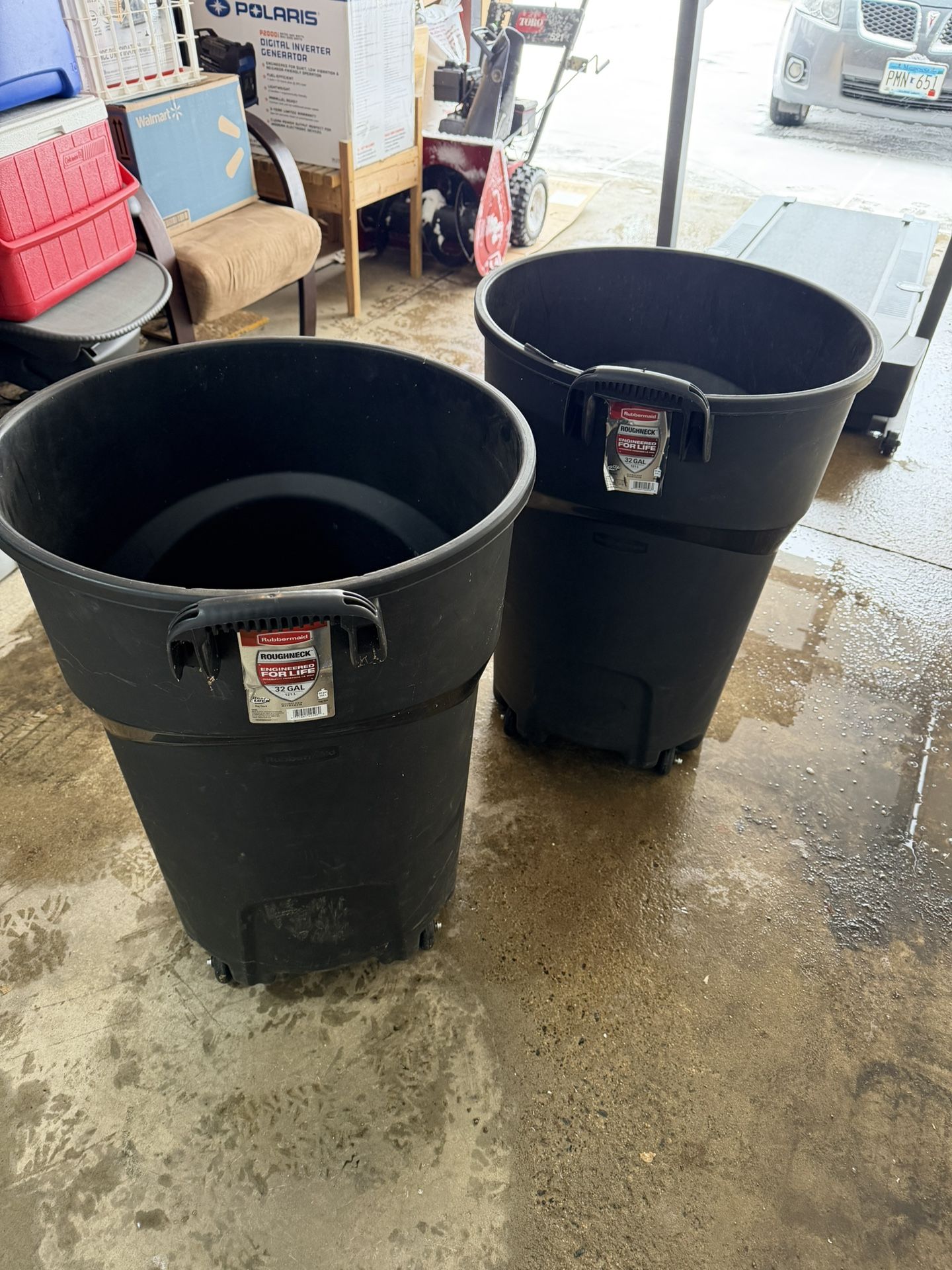 Two Rubbermaid Roughneck 32-Gallon Wheeled Trash Cans – $30 for the Pair