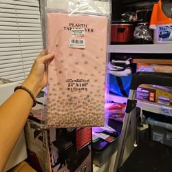 Two Plastic Tablecovers 54"x108"