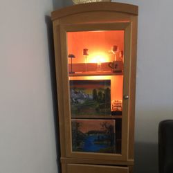 Two Wooden Lighted Cabinets