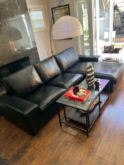 Sleek black leather sectional sofa
