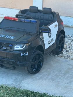 Realistic Police SUV Power Wheels with parental remote control
