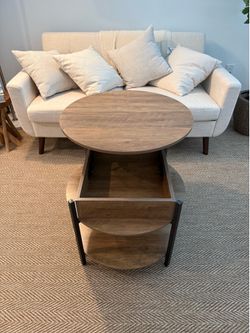 Coffee table with lift up lid and extra storage