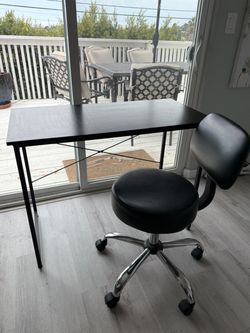 Desk and swivel chair
