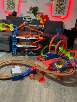 Hot wheels ultimate…  hot wheels loops track….  Monster jam figure 8 jump track