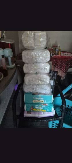 Baby brezza , Baby rocker, Size 2 diapers and w pack of size 1