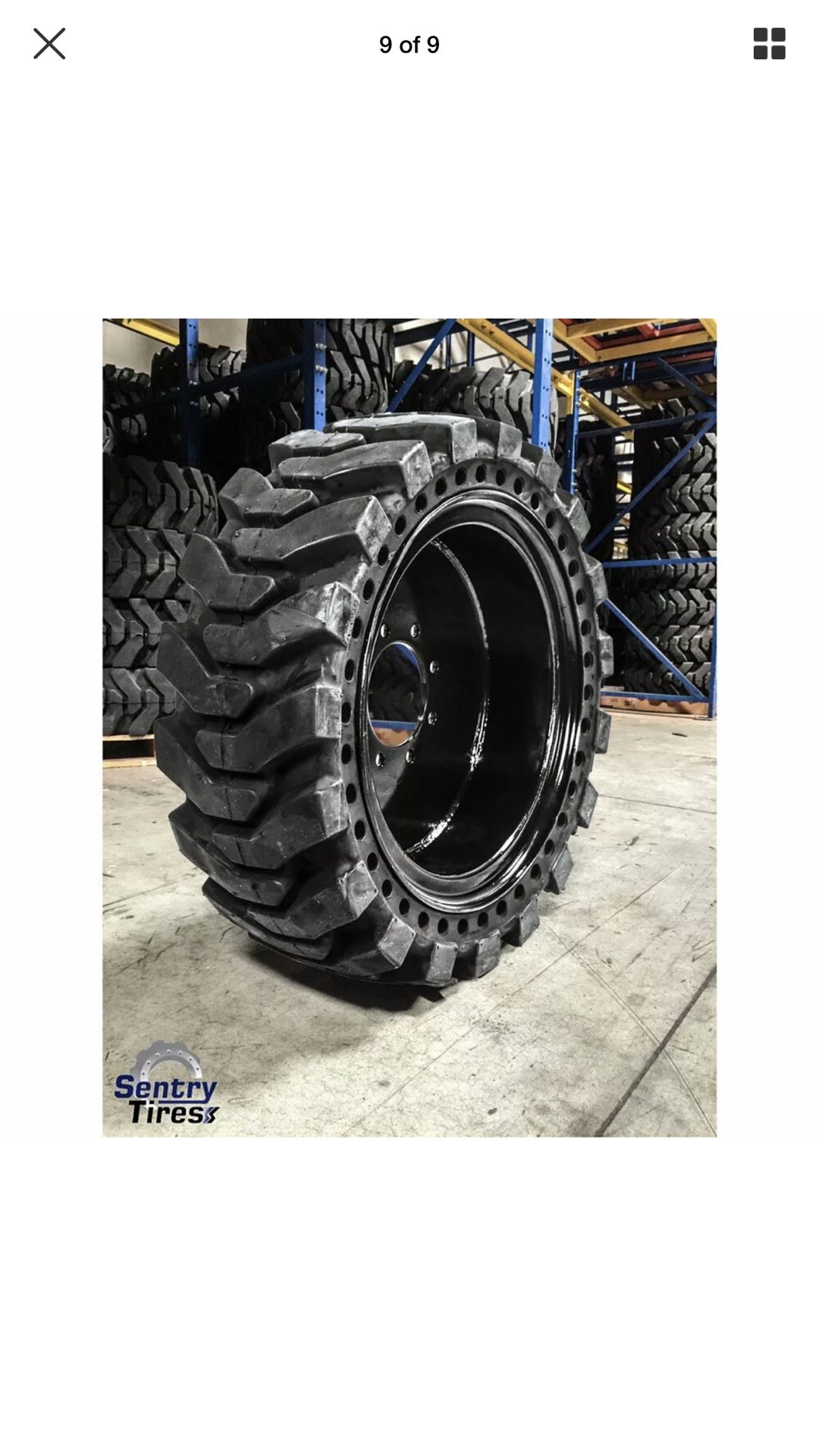 A Set of 4 Skid Steer Tires with Rims Size 12-16.5 8 bolt holes