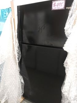 NEW whirlpool 33 in black top and bottom fridge