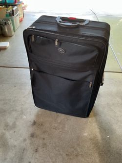33”x22”x11” (14”after extending ) International Millennium Large Rolling Suitcase