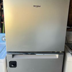 Whirlpool small stainless steel refrigerator in good working conditions asking 24w 24d 61 tall