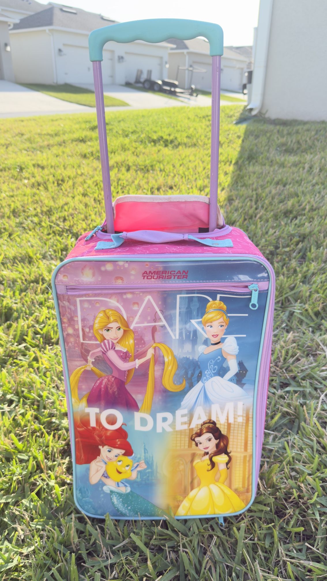 Selling Princess-themed carry-on suitcase, 19x12x7 inches.