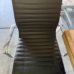 Black ribbed leather office chair.