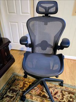Herman Miller Aeron remastered newer style version size B chair fully loaded.